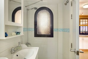 Bathtub, hair dryer, towels