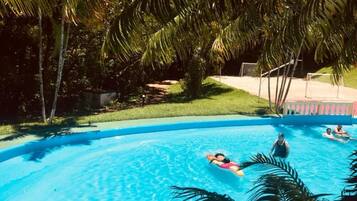 Outdoor pool, pool umbrellas, sun loungers