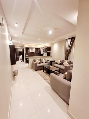 Basic Suite | Living area | 42-inch LCD TV with satellite channels, TV - Dar Ayar Hotel apartments (Riyadh)