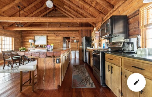  Cabin By the Bay A unique authentic log cabin by the beach with fenced yard