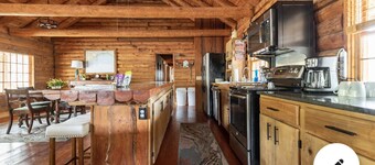  Cabin By the Bay A unique authentic log cabin by the beach with fenced yard