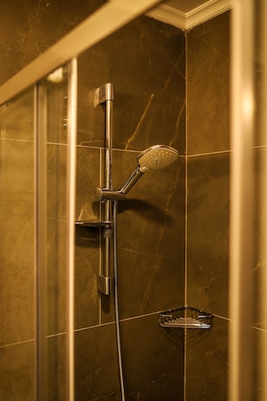 Shower, hair dryer, slippers, towels