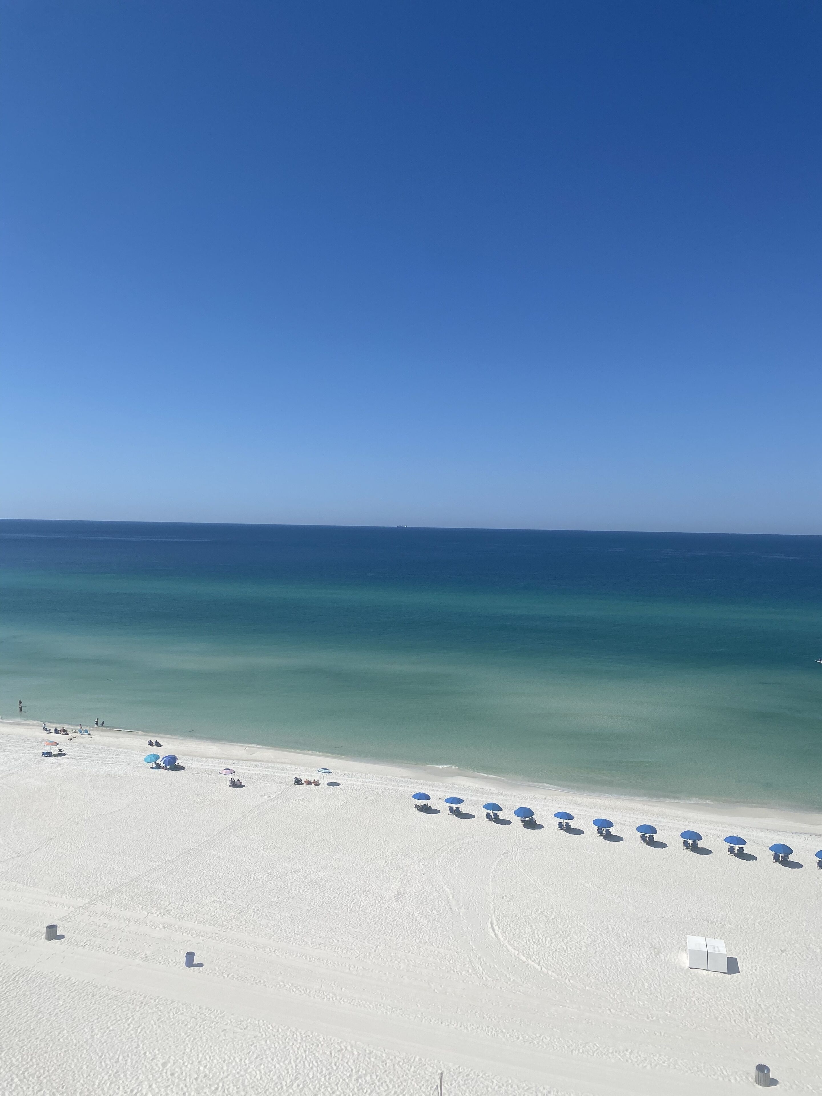 On the beach, sun-loungers
