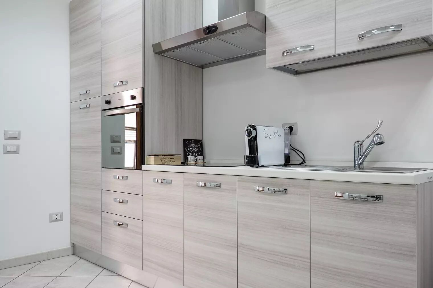 Fridge, oven, coffee/tea maker, cookware/dishes/utensils