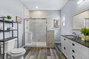 Shower, hair dryer, towels, soap