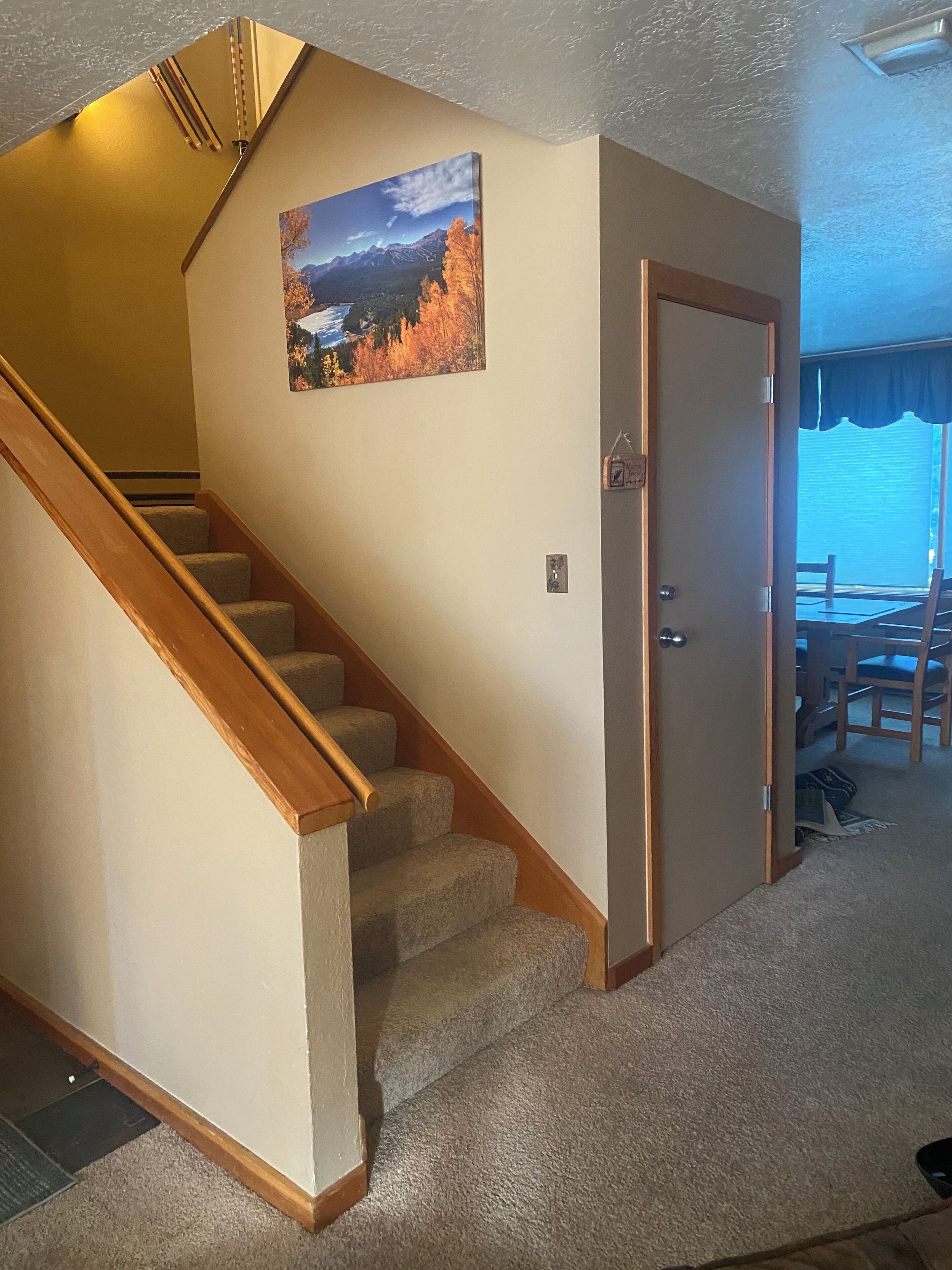 Stairs leading to both bedrooms 