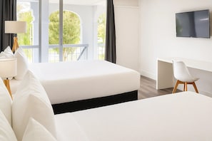 Standard Double Queen | 1 bedroom, desk, laptop workspace, iron/ironing board