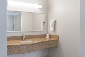 Combined shower/tub, hair dryer, towels, soap