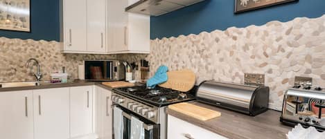Fridge, dishwasher, electric kettle, toaster