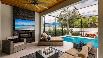 Smart TV, fireplace, books