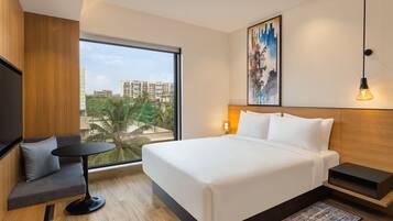 Standard Room, 1 Queen Bed, City View | Minibar, in-room safe, desk, laptop workspace