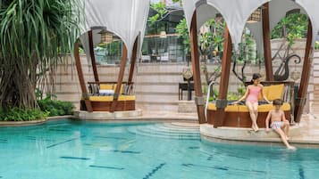 Outdoor pool, open 6:00 AM to 7:00 PM, free cabanas, pool umbrellas