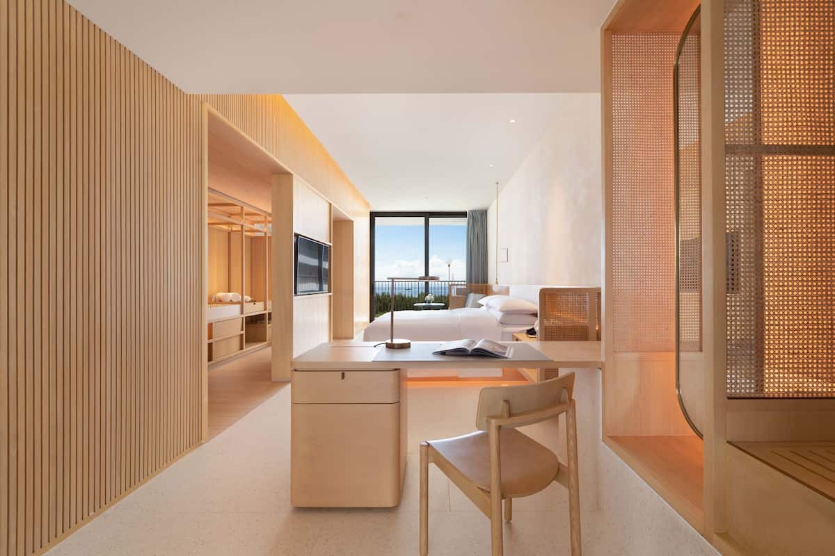 Deluxe Room, 1 Queen Bed, Ocean View | Down comforters, minibar, in-room safe, individually decorated