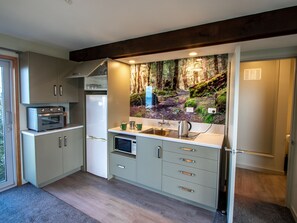 Fridge, microwave, toaster, cookware/dishes/utensils