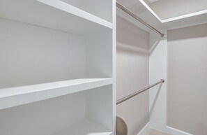 Experience a minimalist retreat with a clean, uncluttered space and a recessed ceiling.