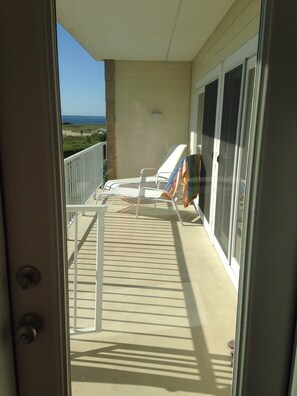 Relax on the balcony with ocean views and enjoy the tranquil atmosphere.
