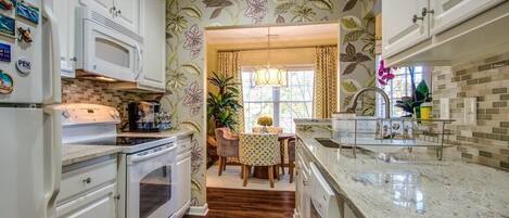 Condo, Multiple Beds, Balcony | Private kitchen | Fridge, microwave, oven, stovetop
