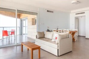Living area - O&O Group - Amazing Sea View 3 BR APT Iconic Tower (Israel)