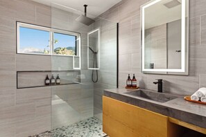 Shower, hair dryer, towels, shampoo