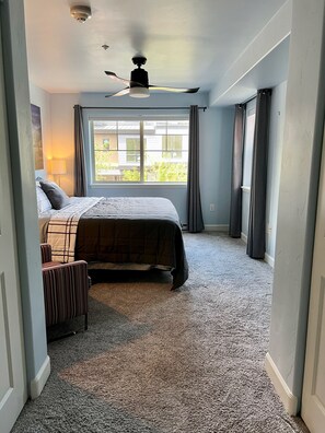 1 bedroom, desk, iron/ironing board, travel crib