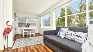 Premium Penthouse | Living area | 35-inch flat-screen TV with satellite channels, TV