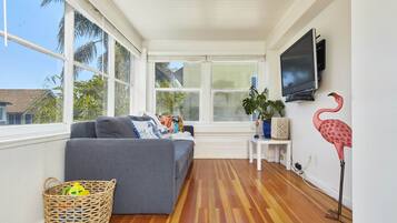 Premium Penthouse | Living area | 35-inch flat-screen TV with satellite channels, TV