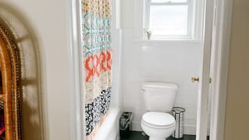 Combined shower/tub, hair dryer, towels, soap