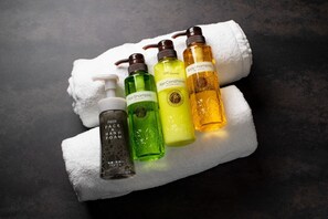 Hair dryer, slippers, towels, soap