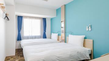 Desk, laptop workspace, free WiFi, bed sheets