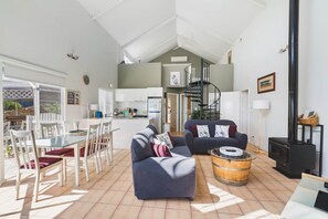 TV, fireplace - Seaview Town House by Peppy Beach Retreats® (6 Adults), Town House (Peppermint Grove Beach)