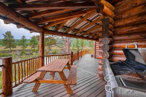 Outdoor dining - Custom riverfront log home w/ hot tub, decks & fireplace (South Fork)
