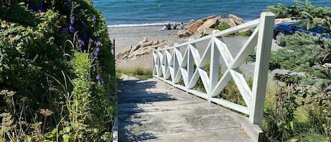 On the beach, sun-loungers, beach towels