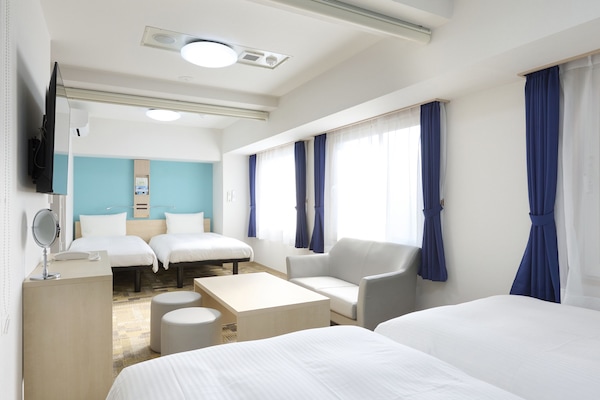 Desk, laptop workspace, free WiFi, bed sheets