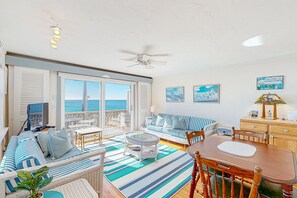 TV, books - Oceanfront, 2nd-floor condo with amazing view - steps to beach, near town/trails (Provincetown)