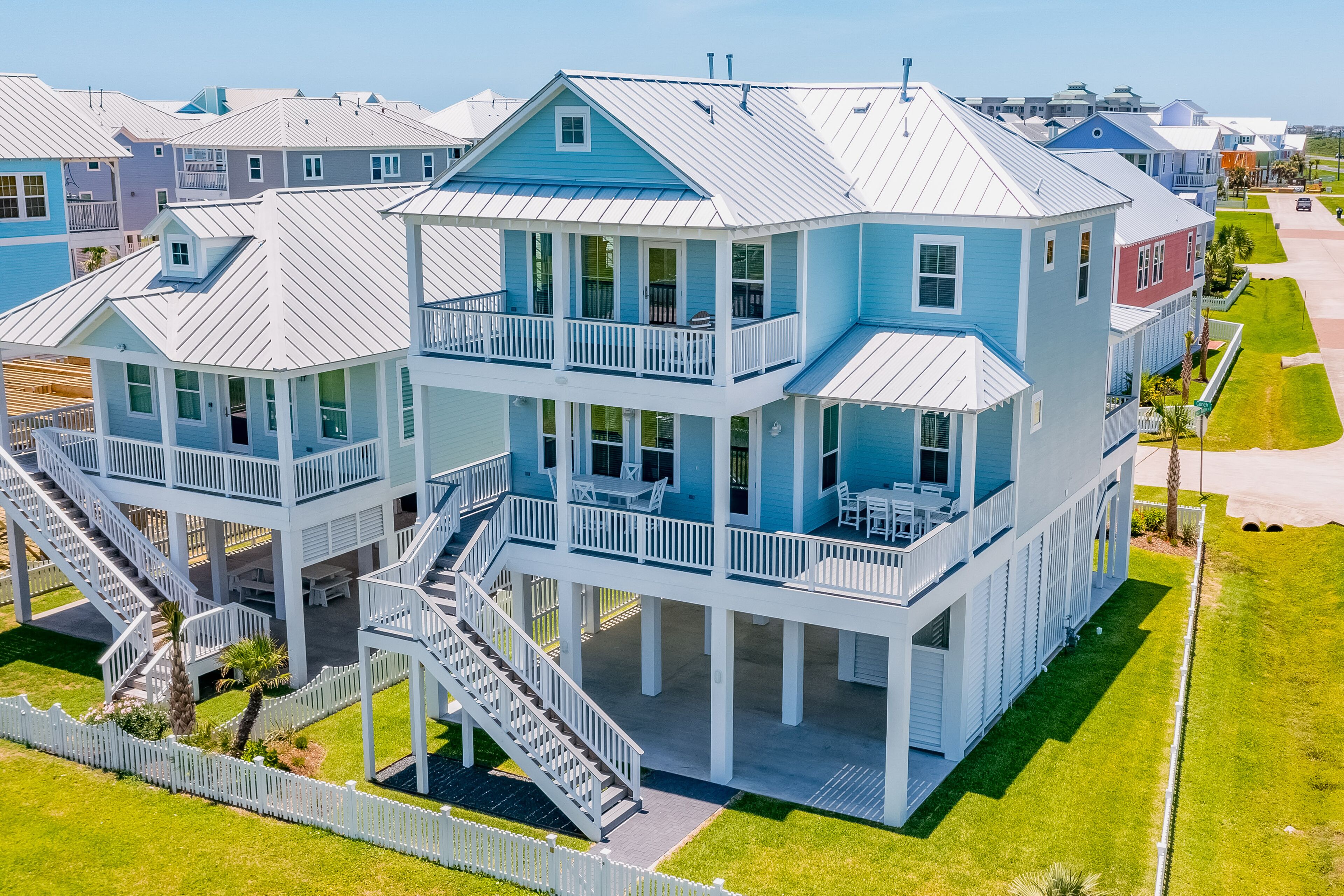 Beachside Village ocean-view home with pool, multiple balconies & EV charger