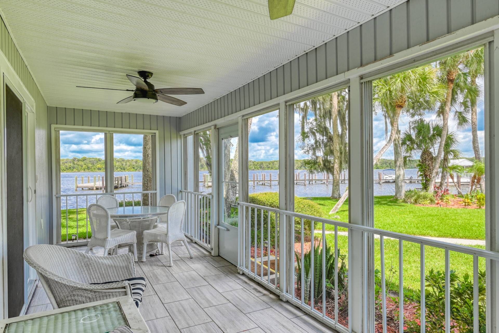 Riverfront Flat w/Large Porch, Fishing & Boating Paradise, Pool, Steps to the Water and Community Do