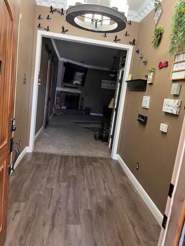 Beautiful three  bedroom home with a gym and huge TV’s! Pet and smoke free home!