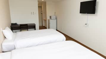 Comfort tvåbäddsrum - flera sängar - icke-rökare - kylskåp och mikrovågsugn | Duntäcken, skrivbord, arbetsyta för laptop och gratis wi-fi