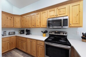 NH380: Pelican View | TL Kitchen & Dining Area View