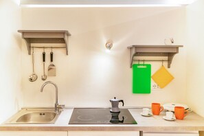 Fridge, stovetop, cookware/dishes/utensils