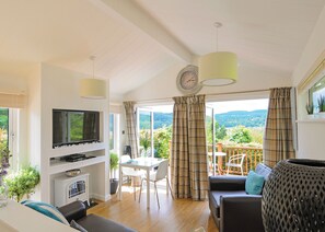 Unclassified image, 2 of 8, button - Lodge with one king-size double with TV. (Newby Bridge, Lake Windermere)