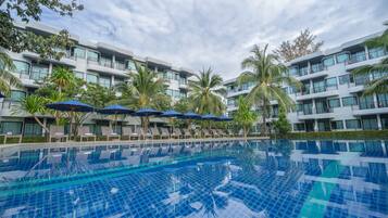 2 outdoor pools, open 8:00 AM to 8:00 PM, pool umbrellas