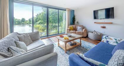 Stunning two storey contemporary lodge on the edge of the lake.