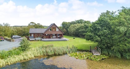 Stunning two storey contemporary lodge on the edge of the lake.
