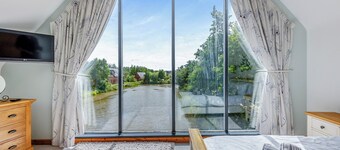 Stunning two storey contemporary lodge on the edge of the lake.