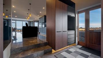Deluxe Apartment | Living area | 75-inch Smart TV with digital channels, TV, iPad