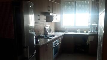 Apartment | Private kitchen | Fridge, microwave, oven, stovetop