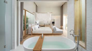 Un dormitorio moderno con una bañera grande, una cama con dosel y vistas al exterior.
