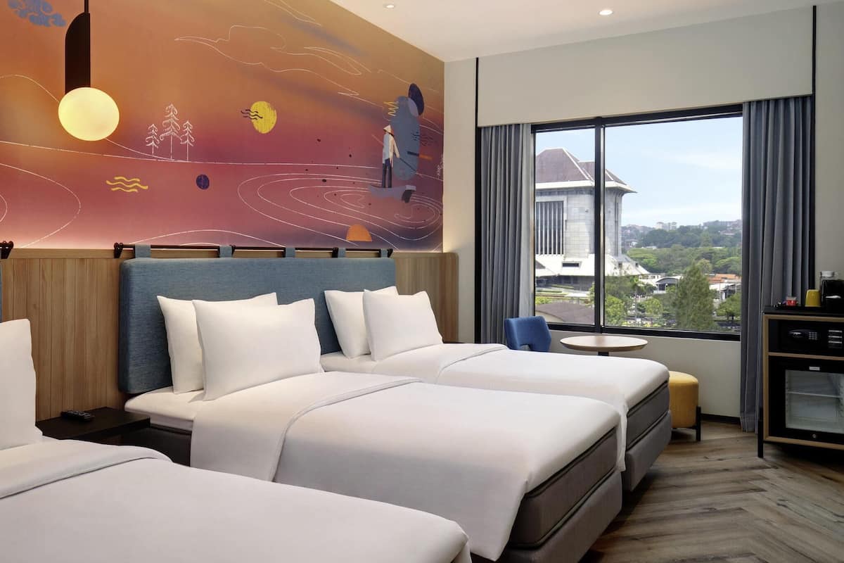 Family Triple Room, City View | In-room safe, desk, blackout drapes, iron/ironing board