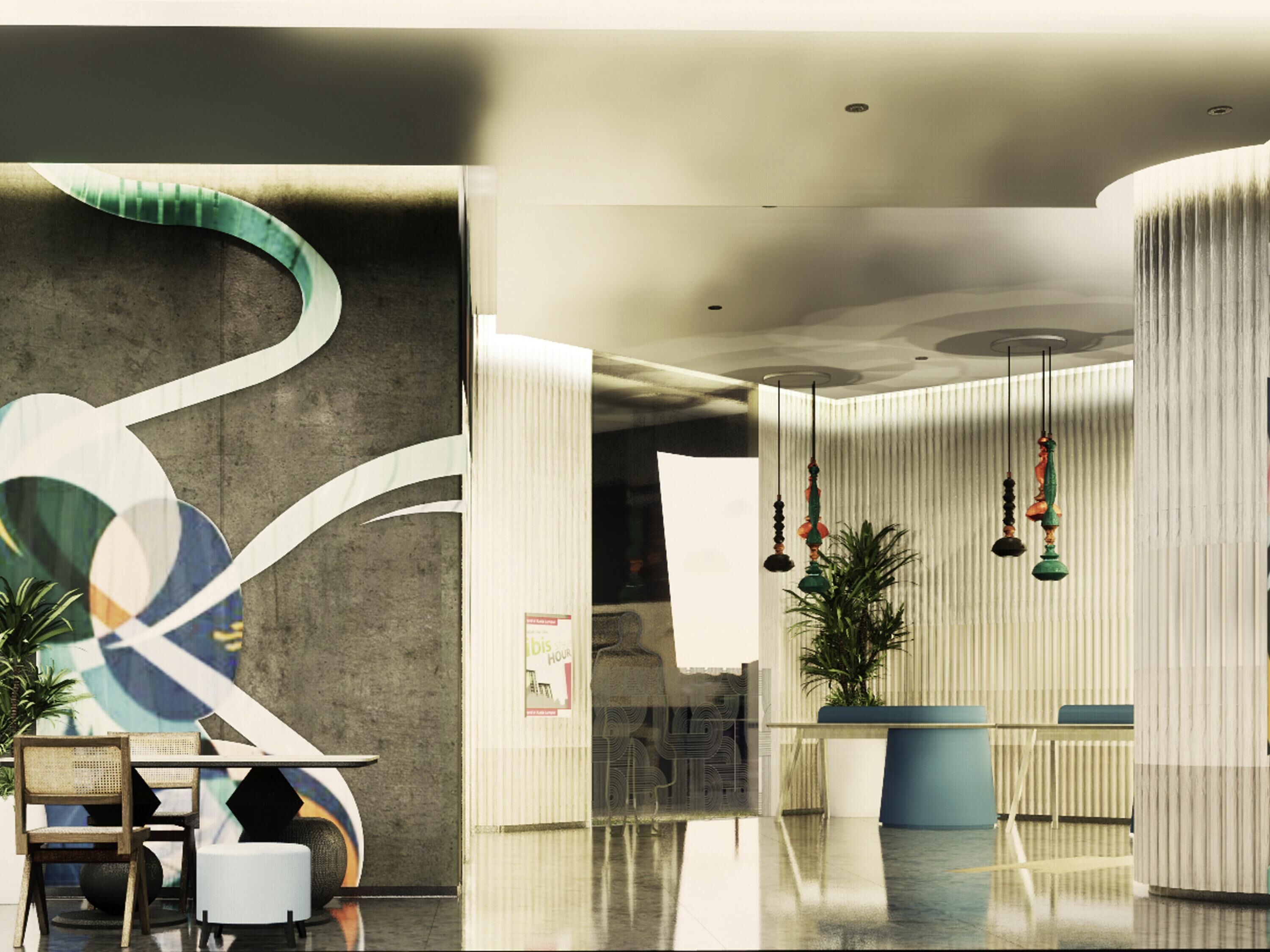 A modern lobby with a reception desk, seating area, and decorative elements.